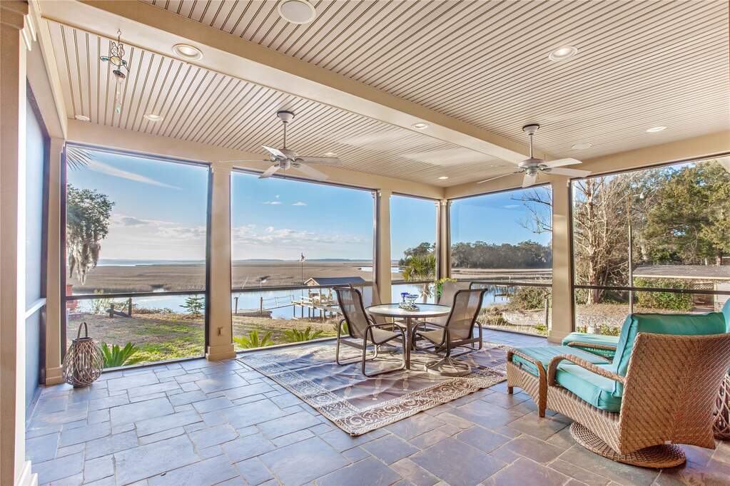 Screened porch, river view.