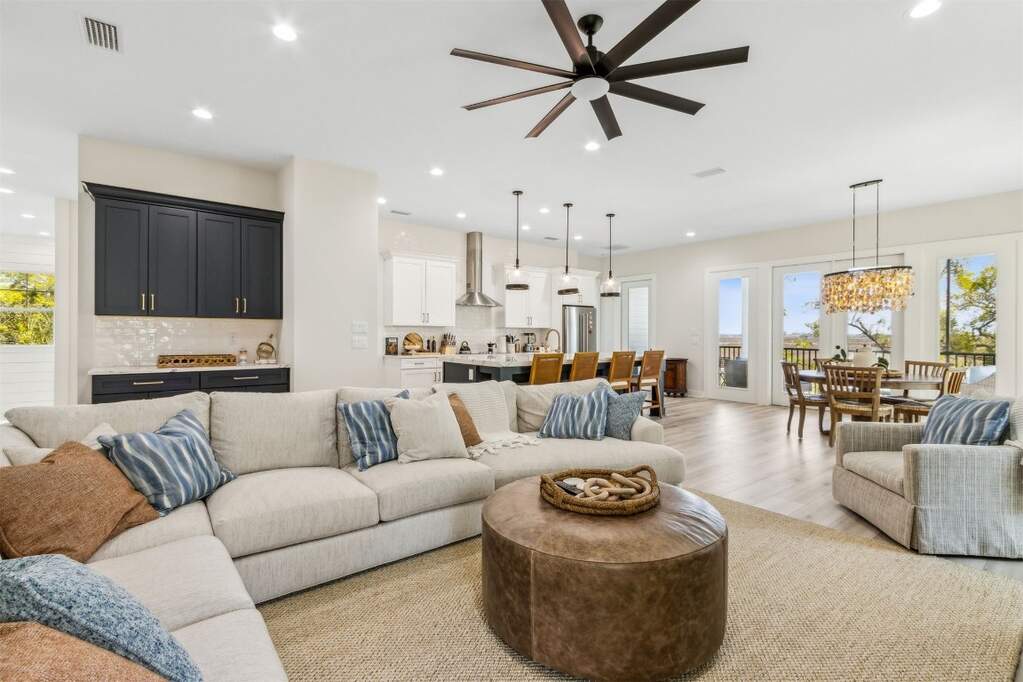 The open-concept living area blends relaxed coasta