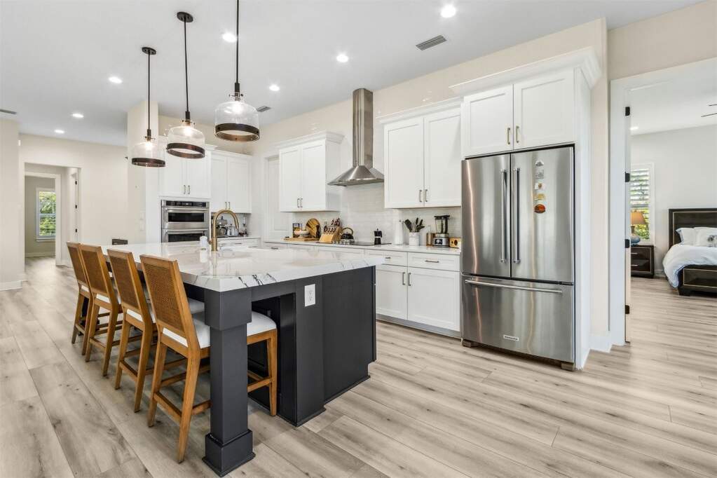 A chef’s dream kitchen featuring quartz counters,