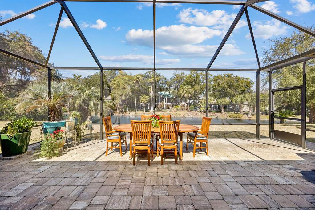Enjoy tranquil lake views from the expansive scree