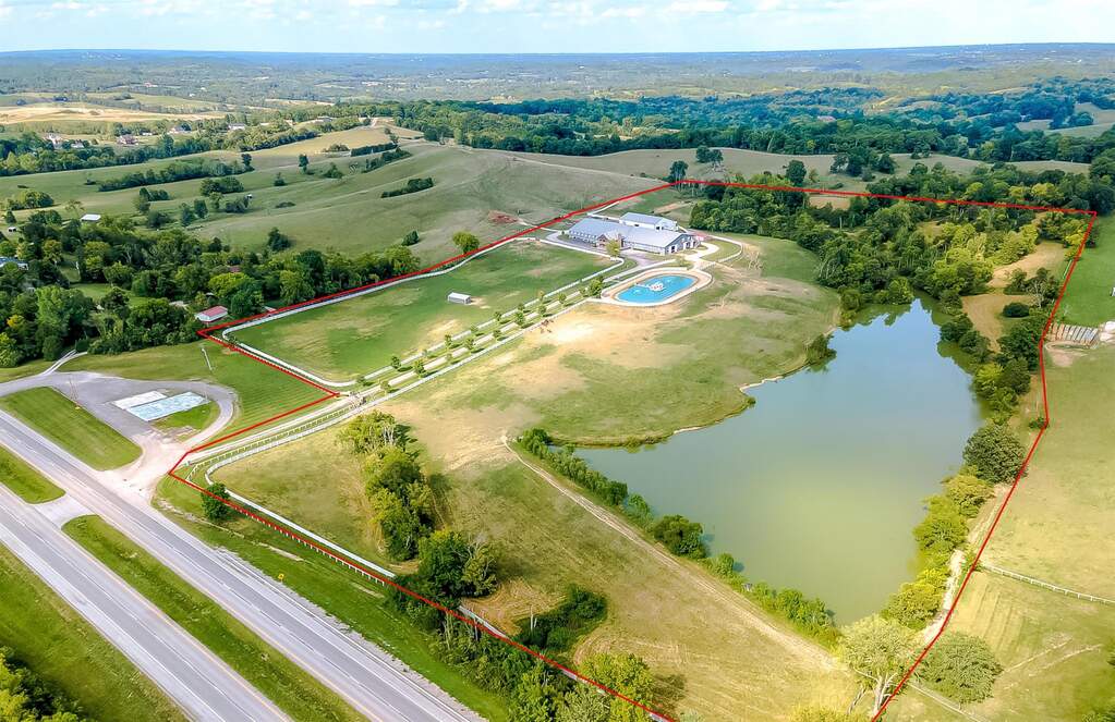 Building site would be approximately 300 ft from the gate to the farm. One side of the driveway would have a lake view. The other would be located in the front field on the north side of the 