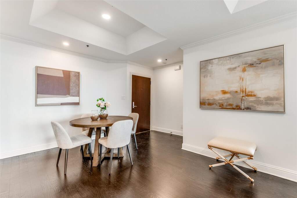 This versatile dining nook is accented by recessed lighting and a neutral color palette, creating a perfect first impression.