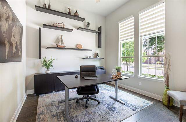 Lovely office space with 12 ft ceilings with fan, custom Sabra shades and Luxury Vinyl Plank flooring
