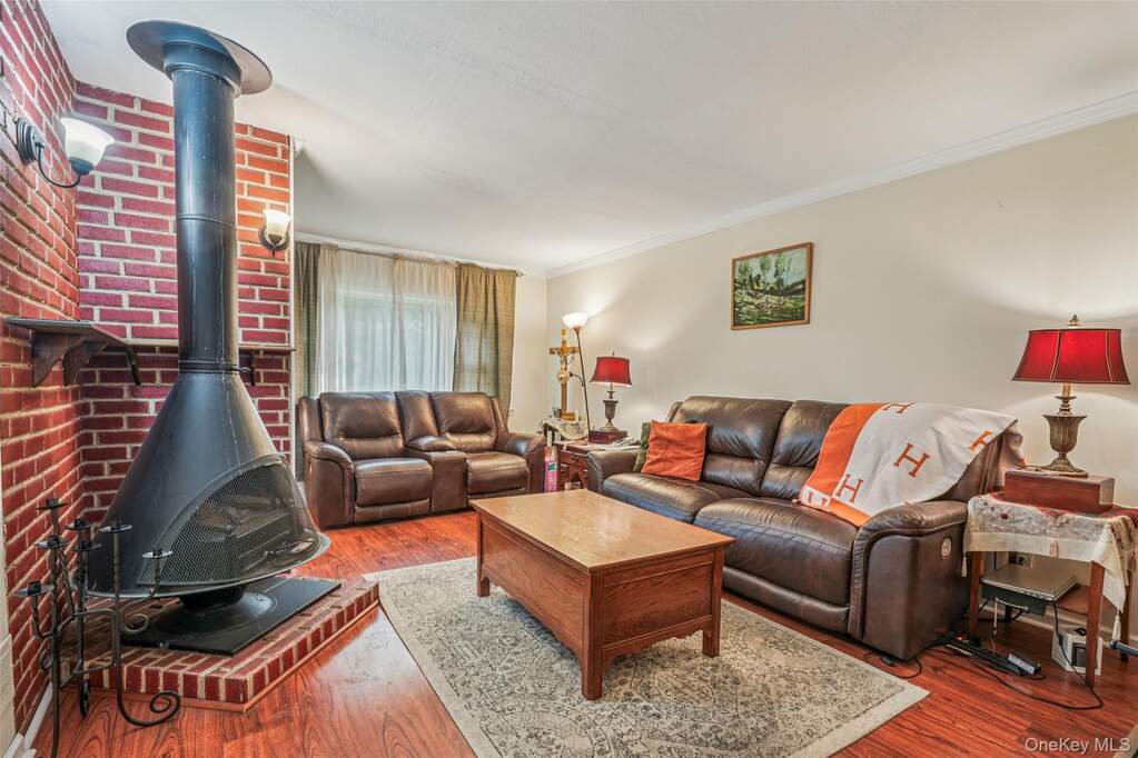 Cozy living room with wood burning stove.