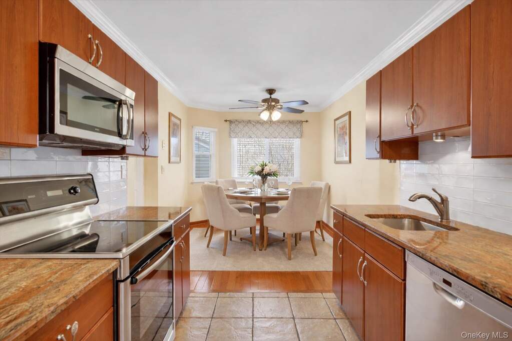 Kitchen with virtually staged dining set