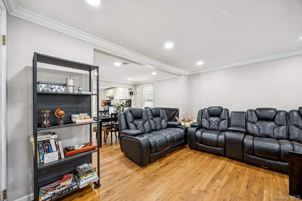 Living Room Hardwood Floors and Recessed Lighting Freshly Painted throughout