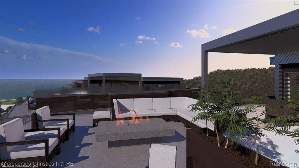 View of patio featuring an outdoor living space with a fire pit