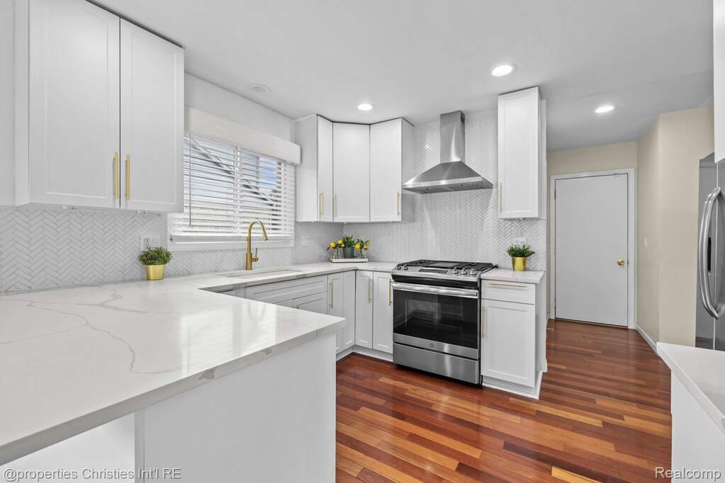 Quartz counters and a Custom Tile Backsplash