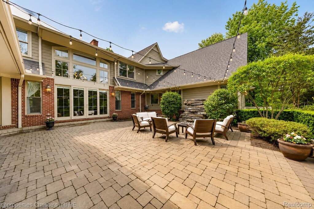 Expansive paver patio with a herringbone pattern