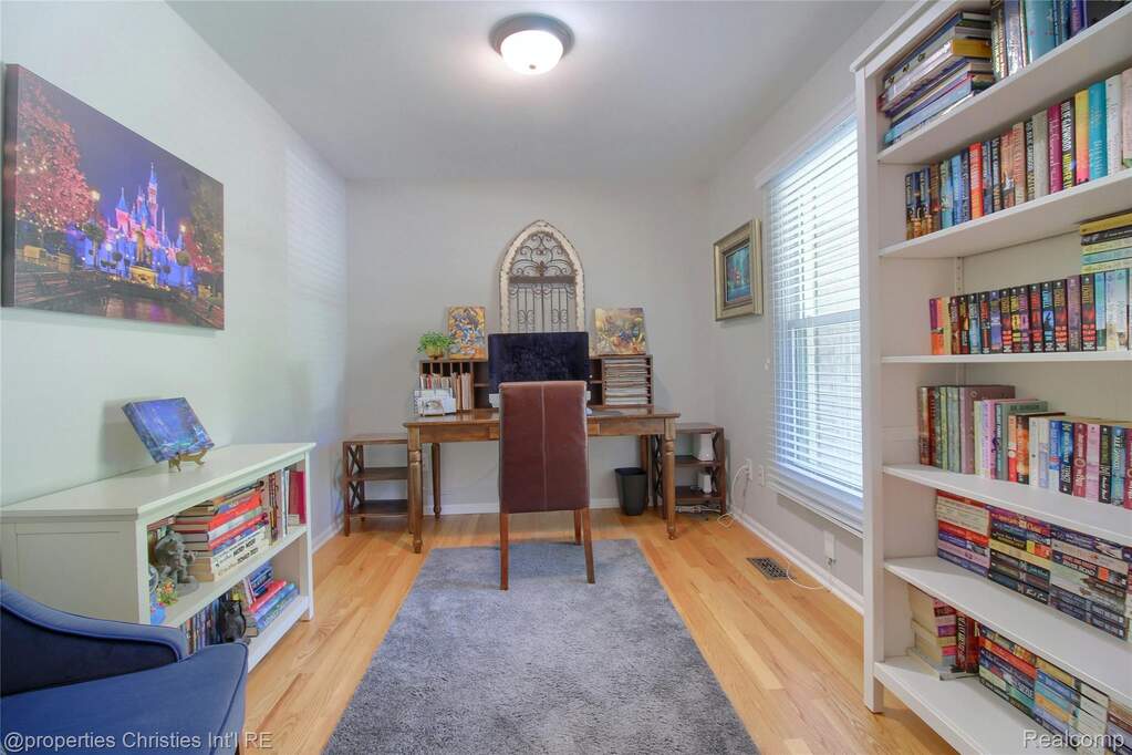 Office featuring light wood-type flooring and baseboards