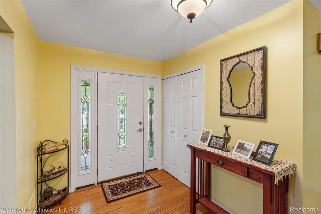 Foyer featuring light wood-style floors