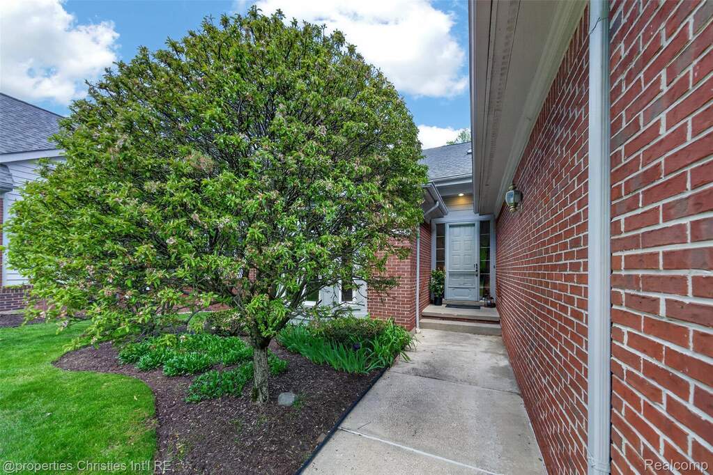 Property entrance with brick siding