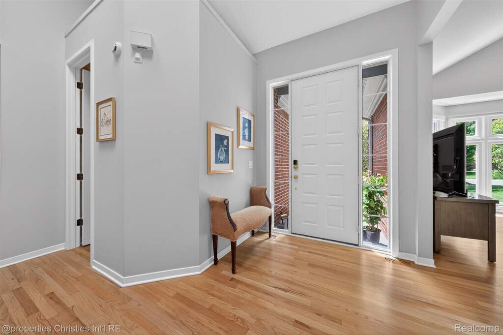 Entryway with light wood floors