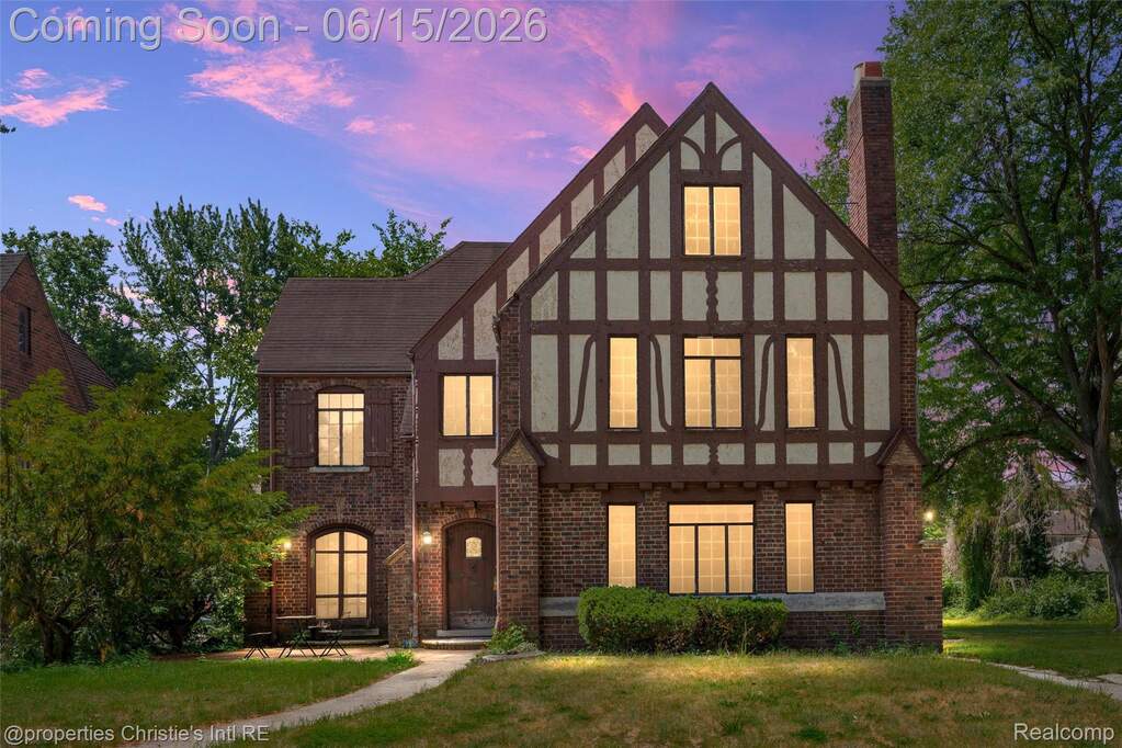 Tudor-style exterior featuring a mix of brick and half-timbering