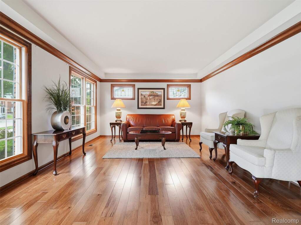 Living room with double hung windows and custom wood work
