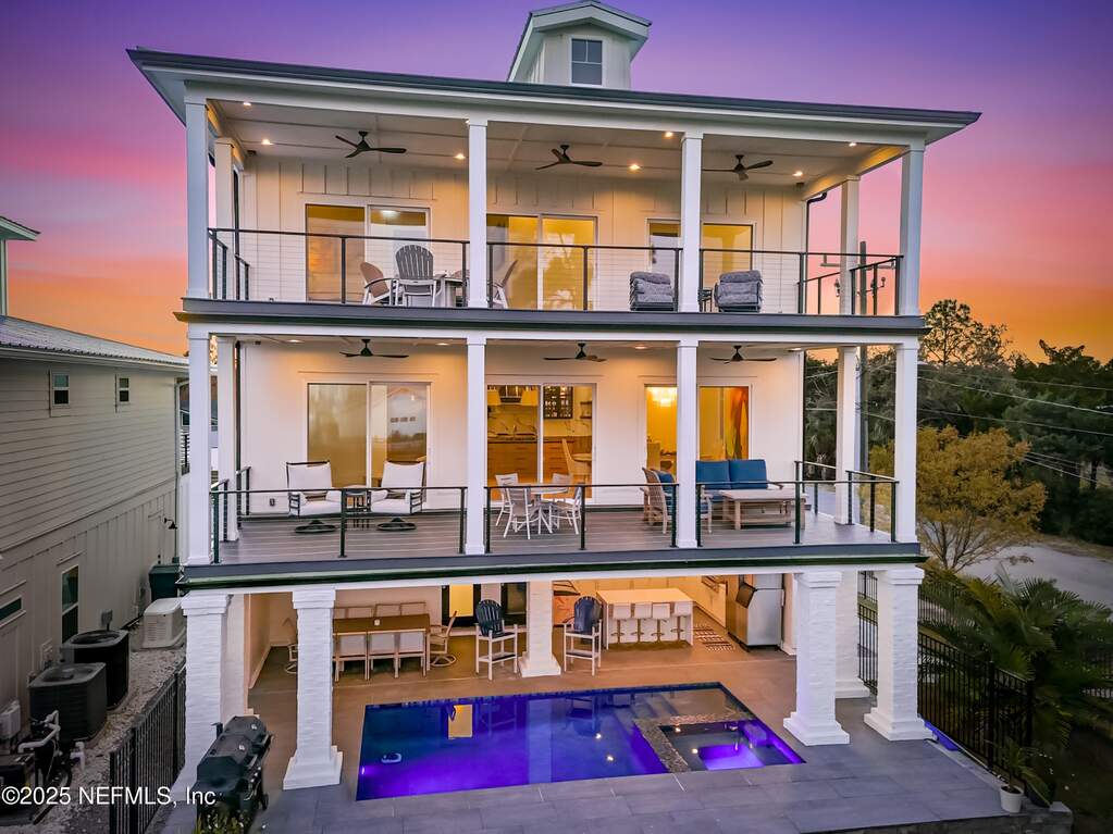 Three Stories, All New Construction - This luxurious property offers breathtaking waterfront views from every floor, making it
a serene retreat.