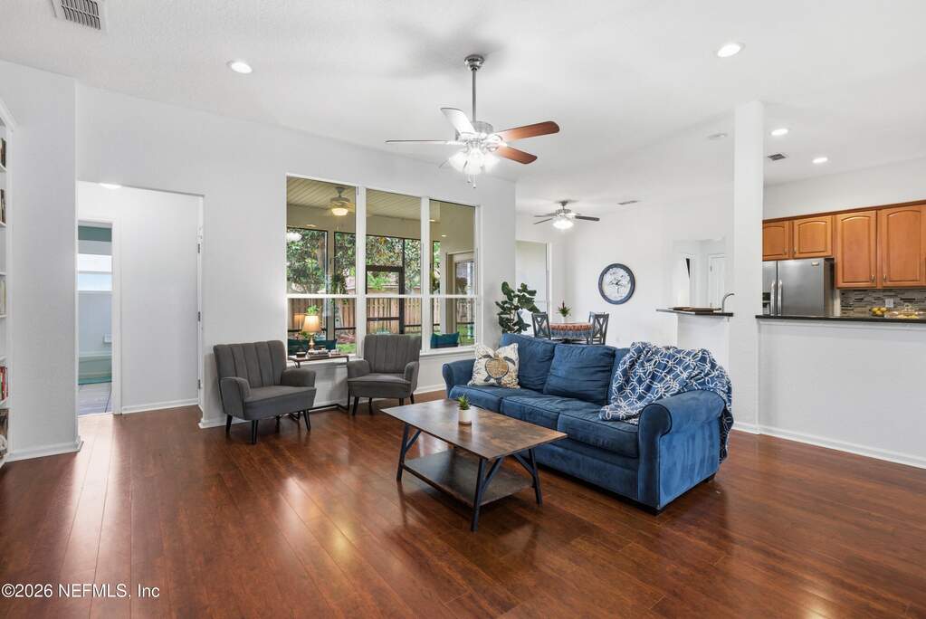 Lots of light creates warmth with earthy vibrancy from the natural tones in this home.