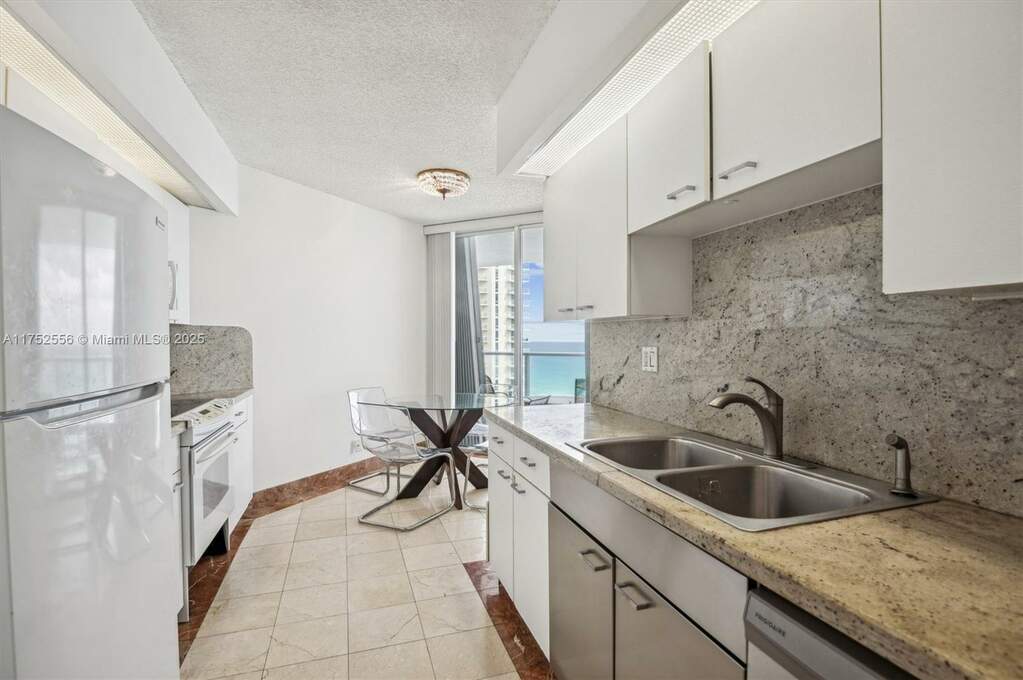 Walkthru Kitchen with Breakfast Area and Ocean Vie