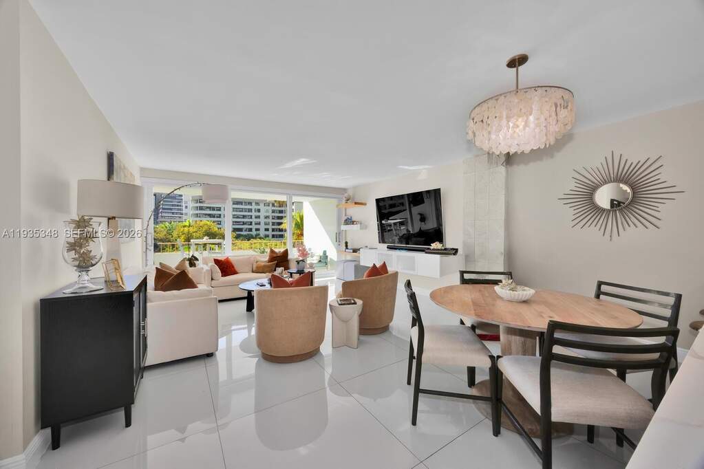 Spacious living/dining area leading to a wide balc