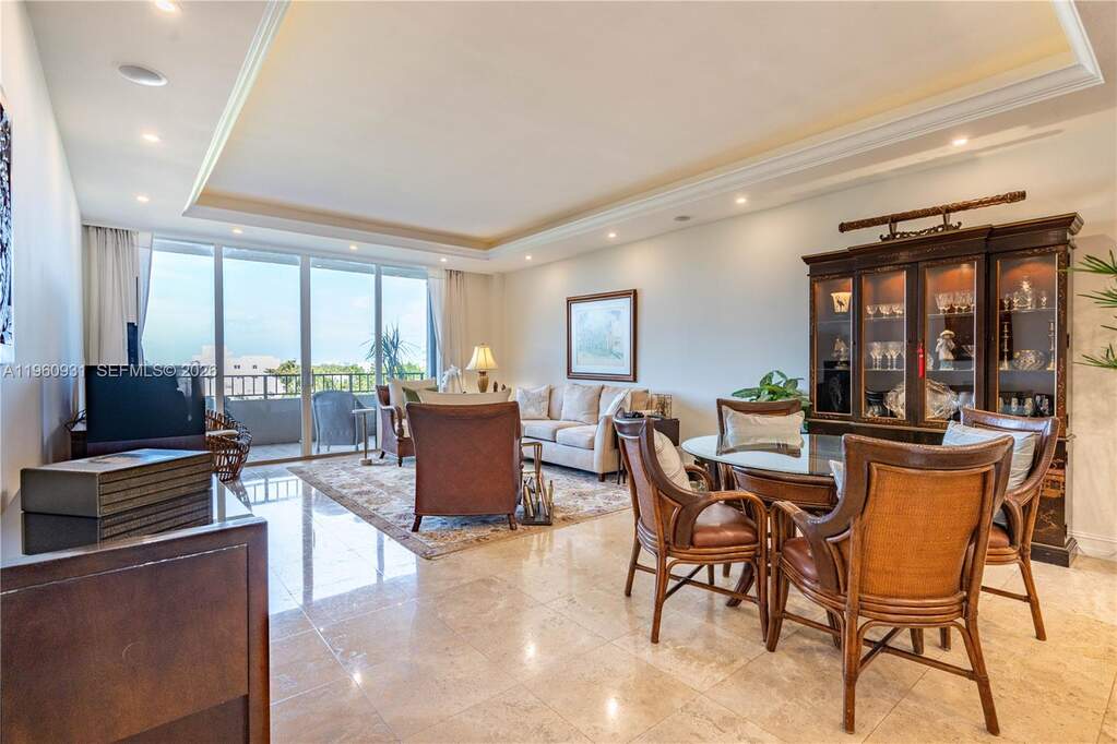 A spacious, open-plan great room features a light