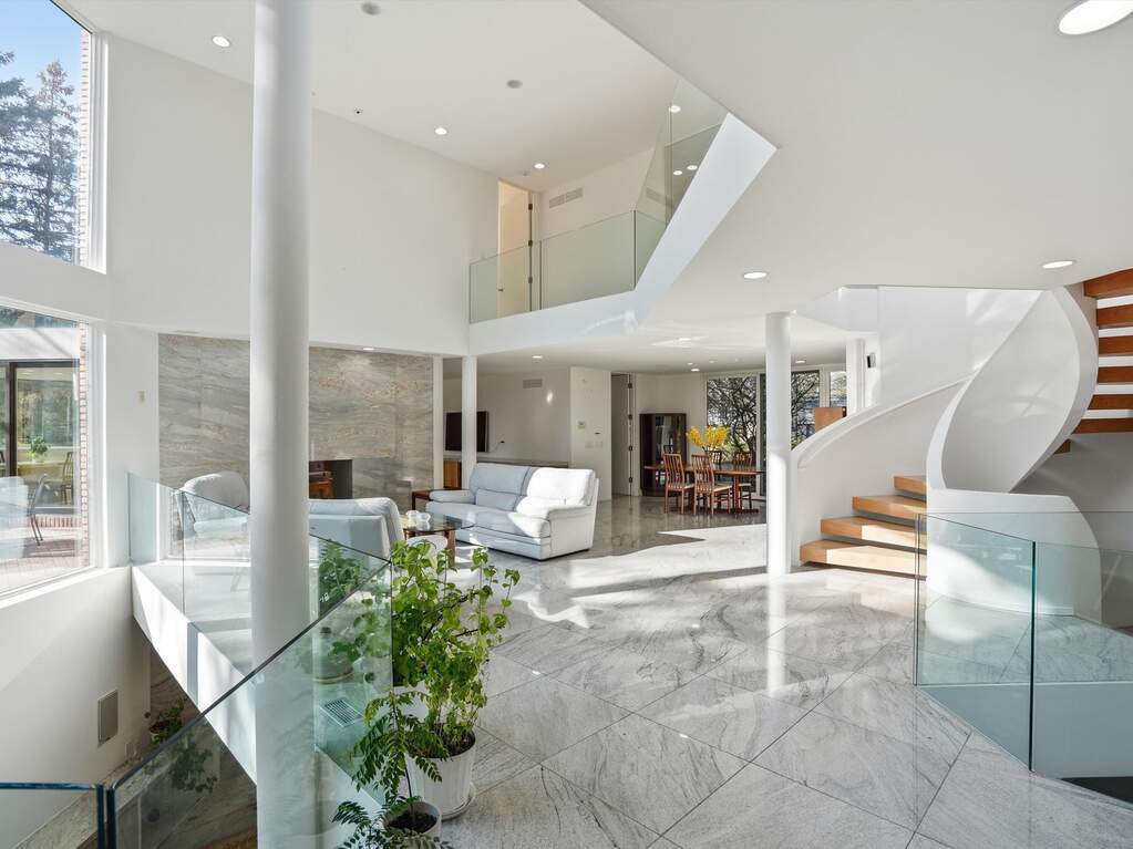 Great Room with Full Marble Floors, grand spiral staircase