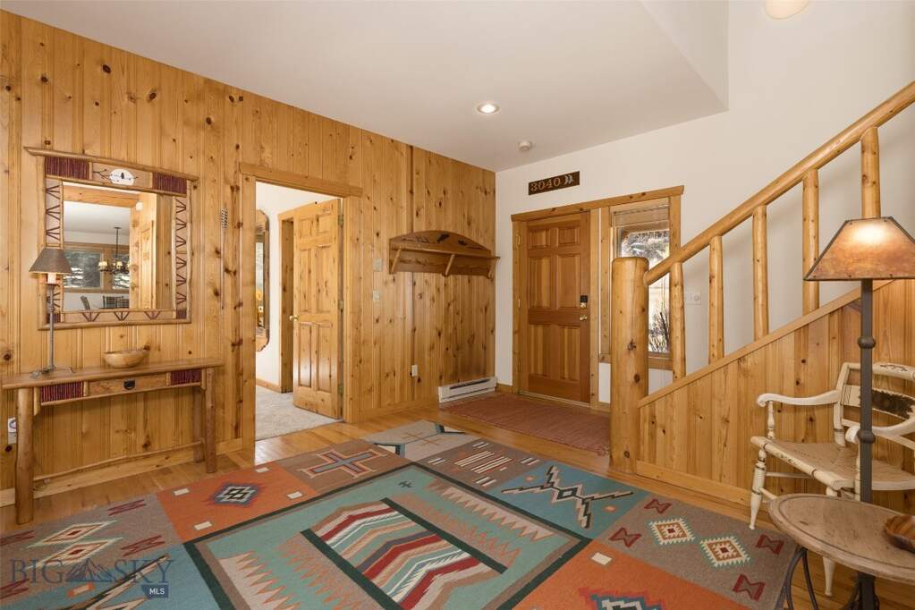 Main level entry area, stairway to upper level and