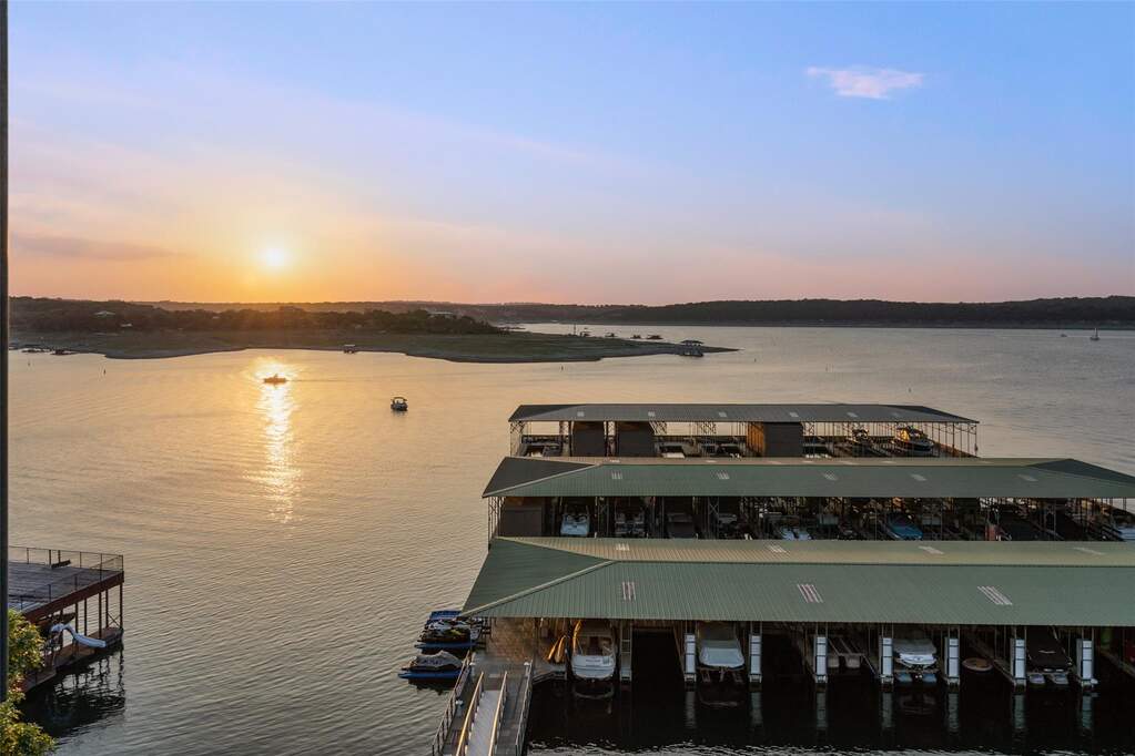 Property may come with boat slip in private community marina.