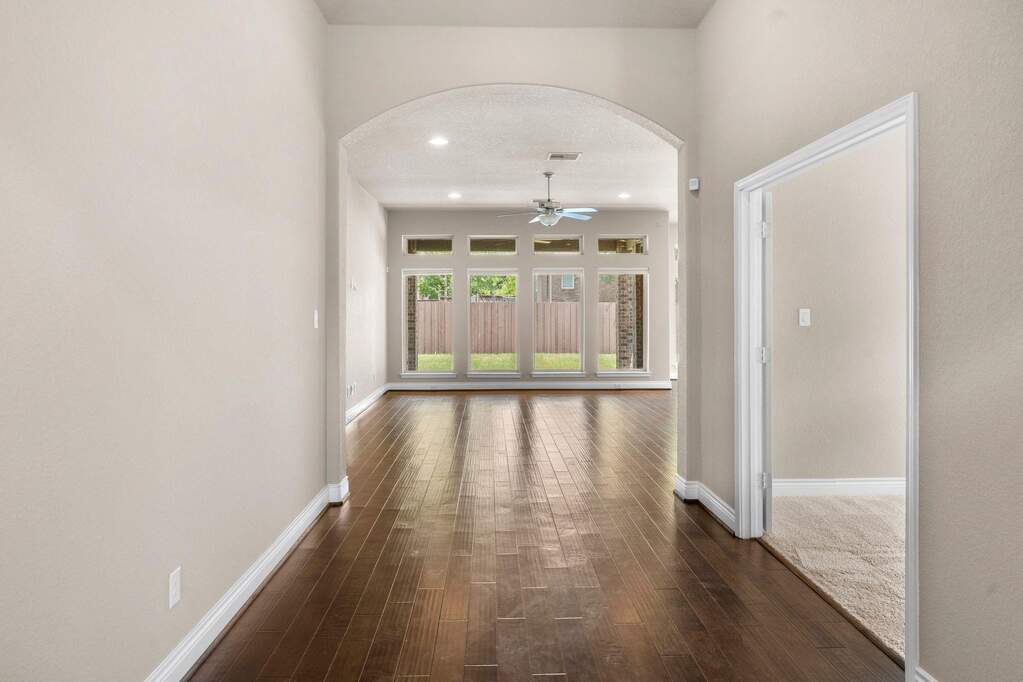 Step through the front door into a bright entry foyer that instantly makes you feel at ease and sets a natural flow for the rest of the house