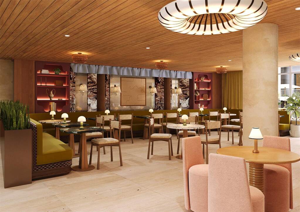 The lounge sits adjacent to Cuvée Coffee and Cocktails and connects directly to the pool, creating an inviting setting for light bites and relaxed conversation.
