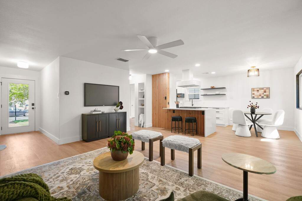 The open-concept living spaces are bright and inviting, making the space perfect for having company over