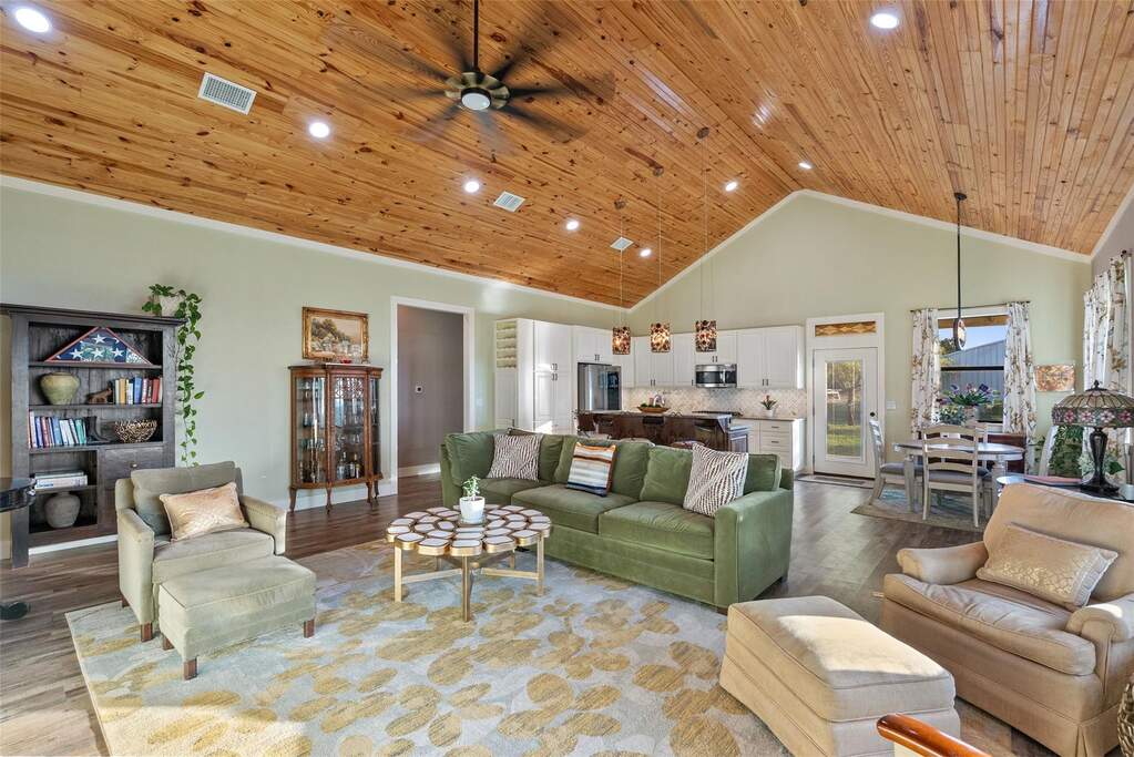 Main house has high vaulted ceilings and a bright open floorplan. 2BDRMs/2baths + bonus room in the main house.