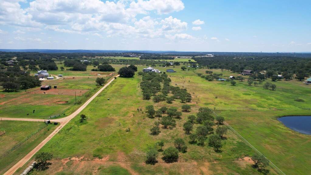 View of property location featuring a nearby body of water and rural landscape