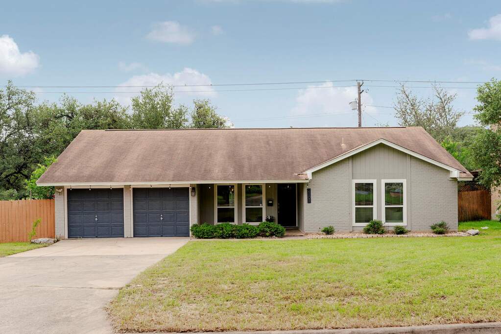 Single-story South Austin home with fresh modern updates, oversized driveway parking, and easy access to Menchaca, South Lamar, and South Congress