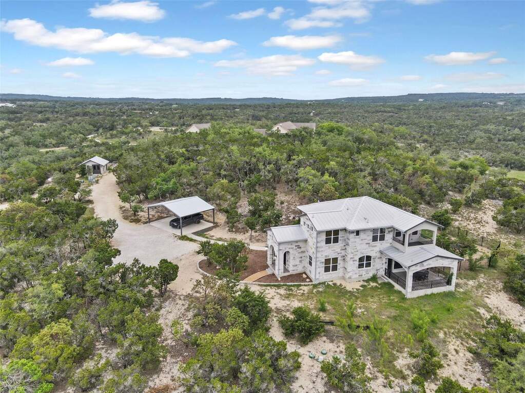 Hilltop House at its elevated position on the property.