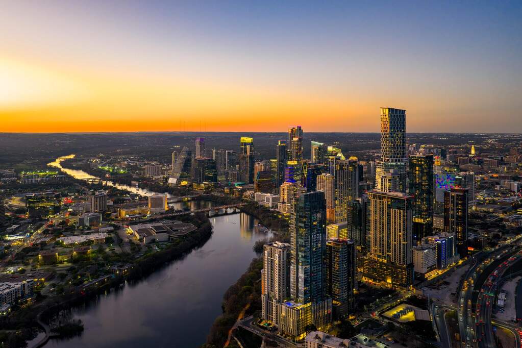 Aerial view at dusk of a water view and a city view