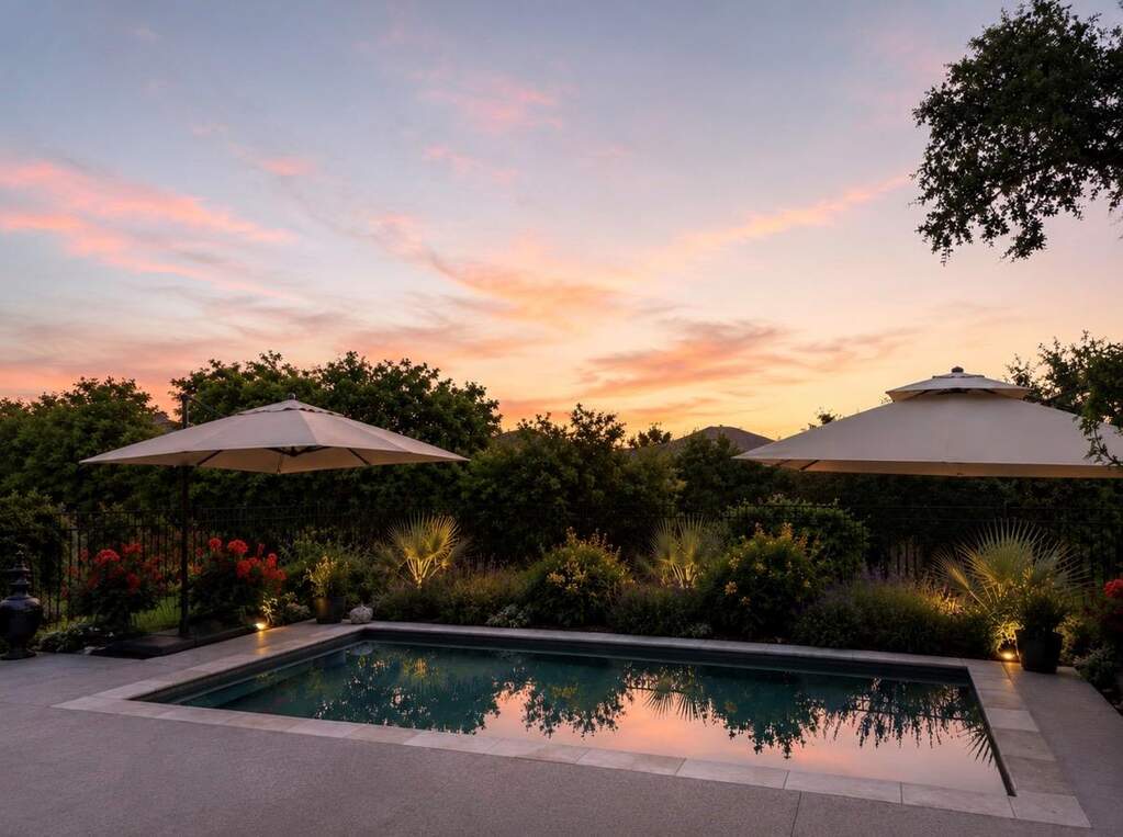 Sun rises behind the house on the left side