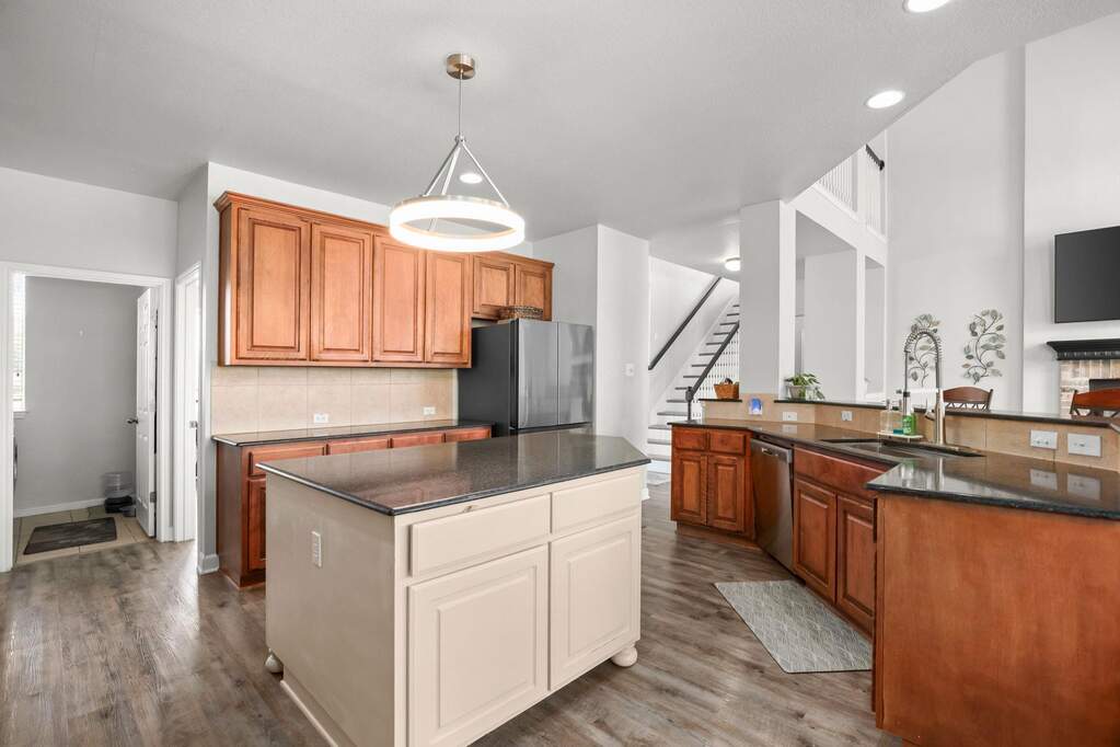 The main living spaces feel connected and inviting, seamlessly flowing together and ideal for entertaining
