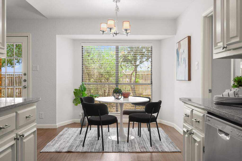 The breakfast area right off the kitchen is perfect for a quick bite or enjoying your morning coffee