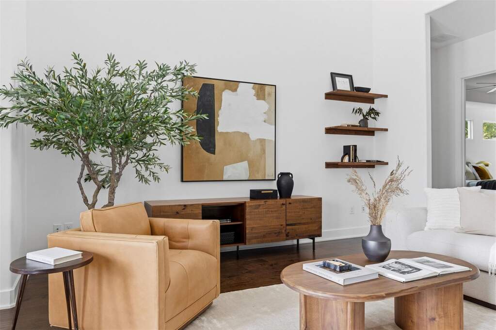 The versatile layout offers the perfect cozy corner to curl up with a good book by day, or unwind with your favorite movie at night