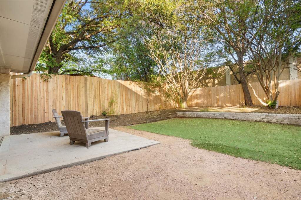 Fenced backyard featuring a patio area
