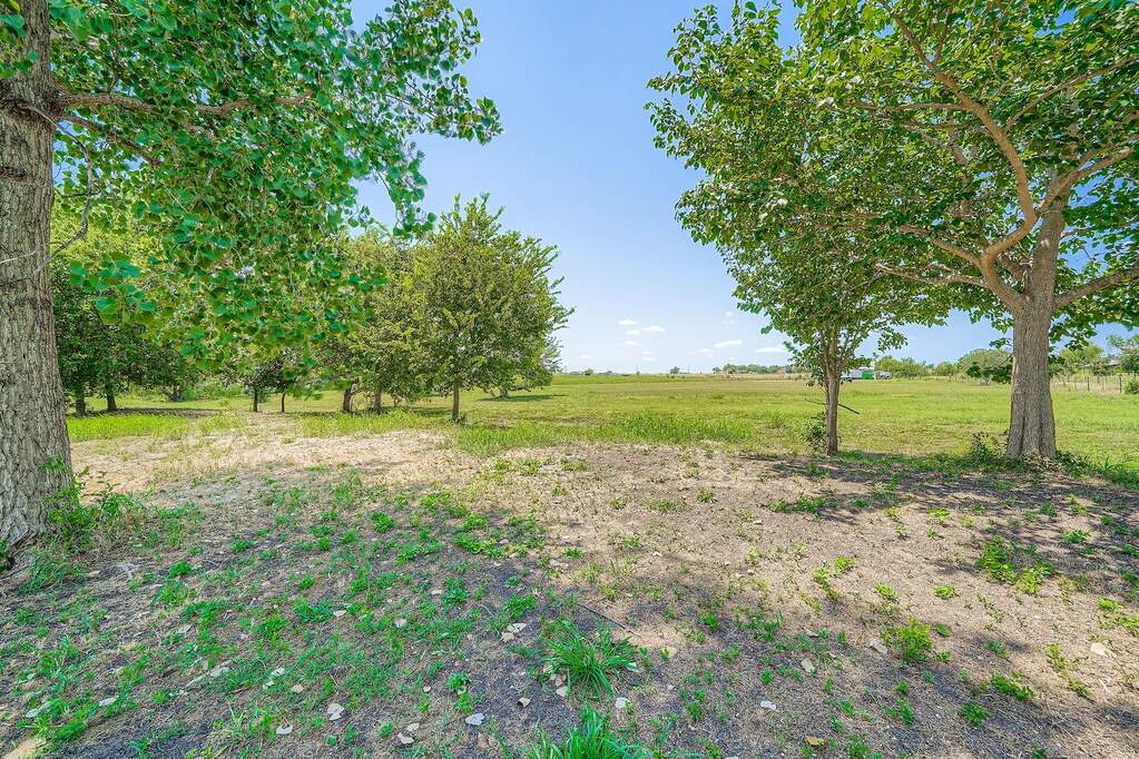 View of yard featuring a view of rural / pastoral area