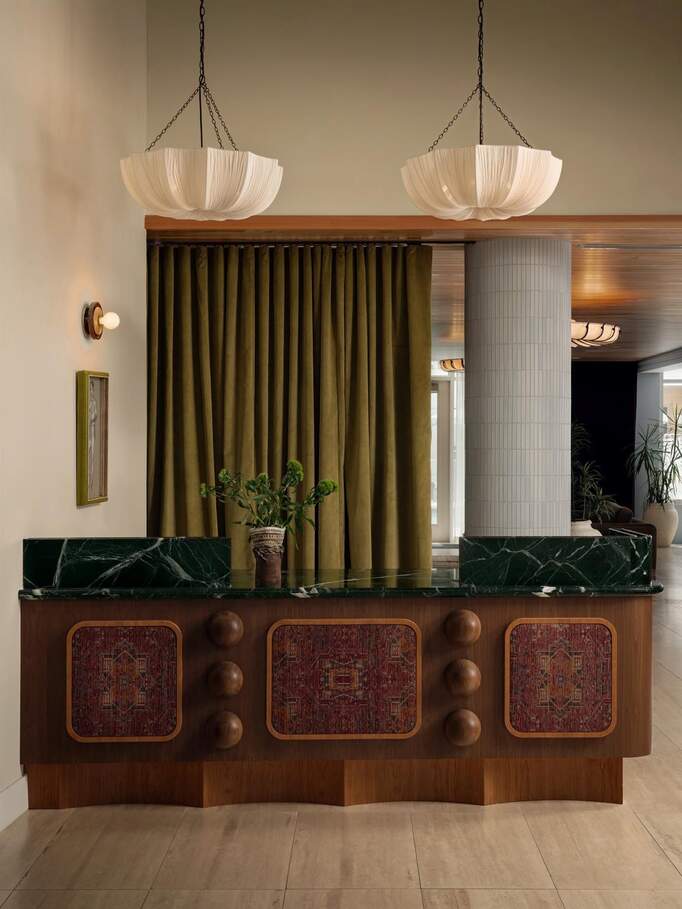 The entry experience begins with the 24-hour concierge at reception, and flows into the lounge by award-winning Kim Lewis Designs.