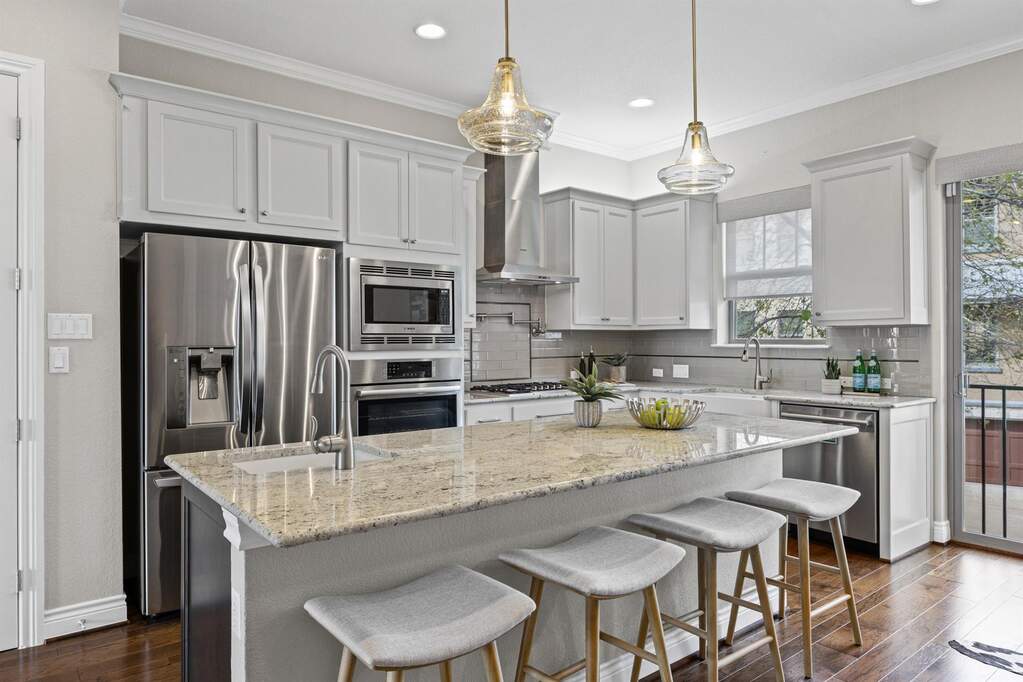 Large center island with prep sink—perfect for entertaining or casual meals