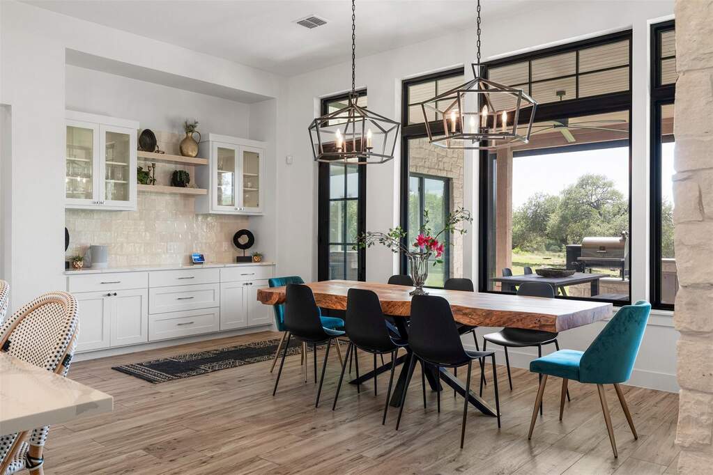 Share meals against a changing backdrop of Texas skies, where the open layout comfortably accommodates large tables for gatherings